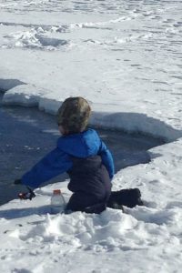Ice fishing for the hale and hardy - even for a four year old.
