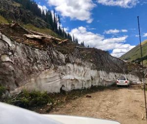 Mountain travelers still finding snow banks that will remain for next year.